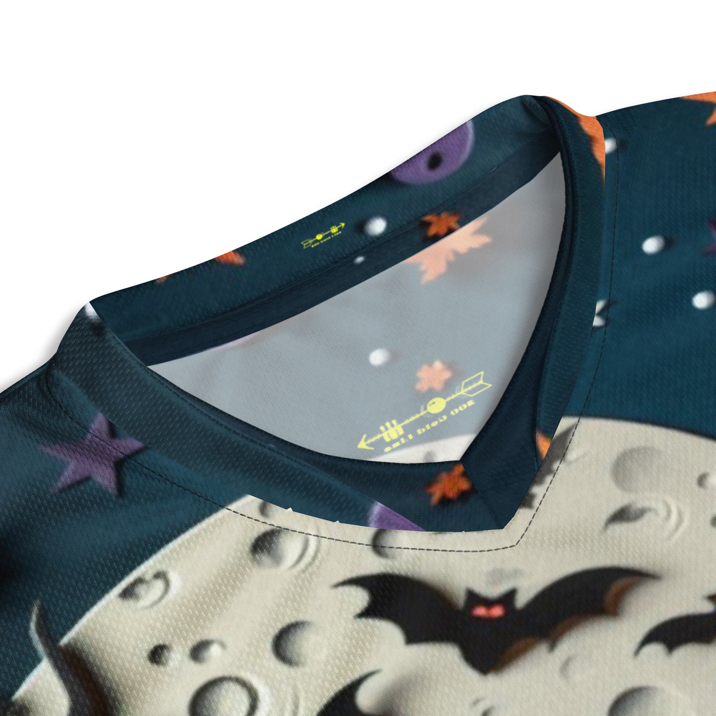 Halloween-themed shirt with moon and bat design on a white background